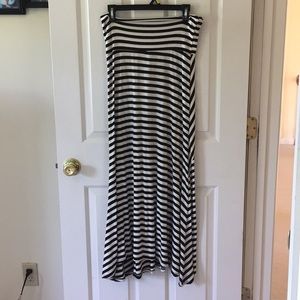 Long black and white striped skirt.